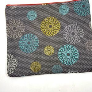 Crypton Architex laptop/tablet case brown teal yellow and cream April patterns